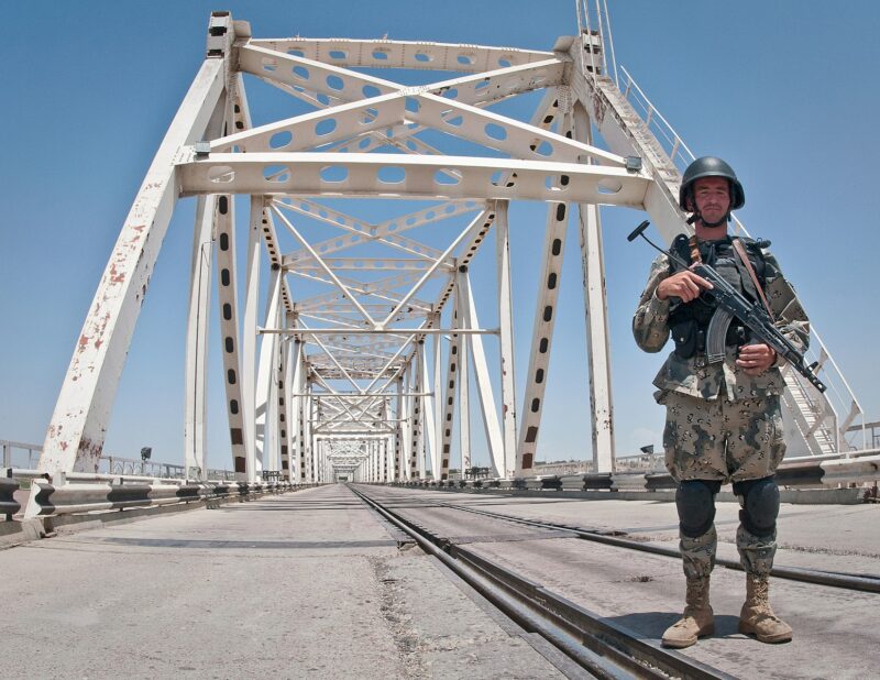 Officer of the Afghan Border Police at the Afghanistan Uzbekistan Friendship Bridge Cronos Asia